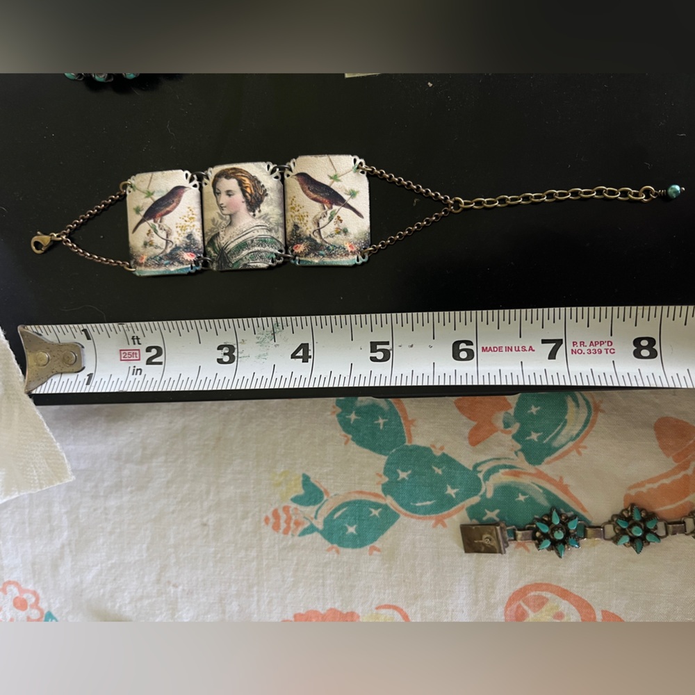 Elegant Bird and Portrait Bracelet. Victorian Trading Co.